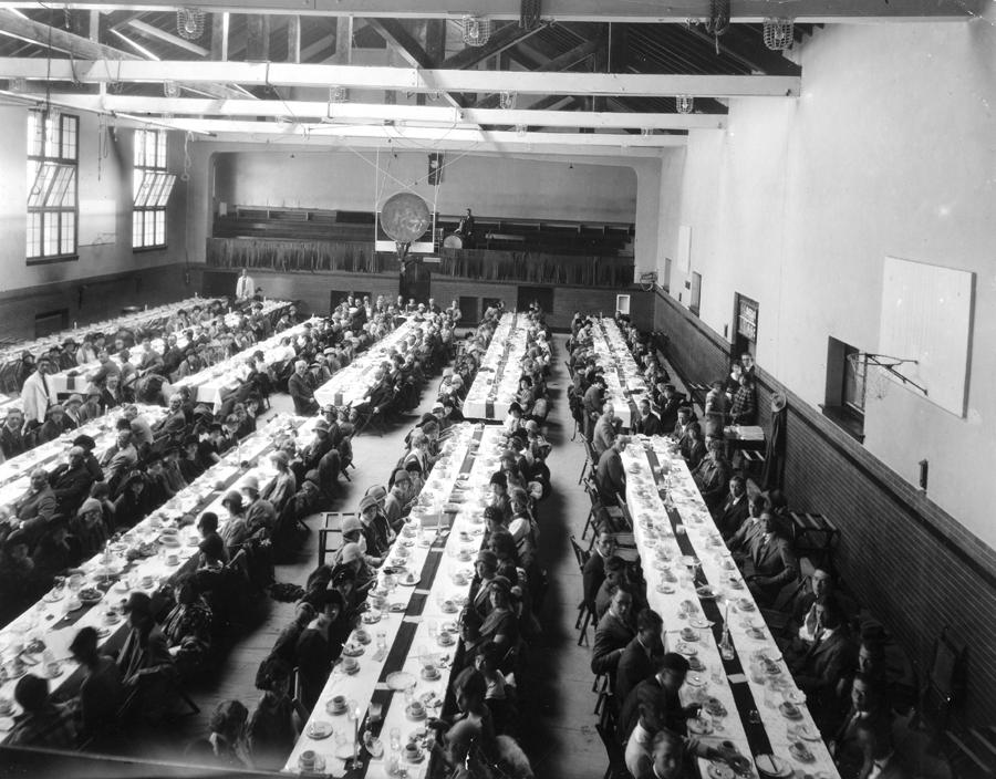 Homecoming dinner - The men's gym was used as a Dining Hall prior to the 1950s, when coed dining commenced in Taylor Hall <span class="cc-gallery-credit"></span>